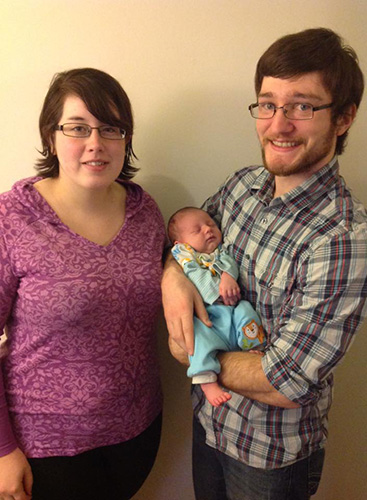 Brittany Jeffrey holding Mason